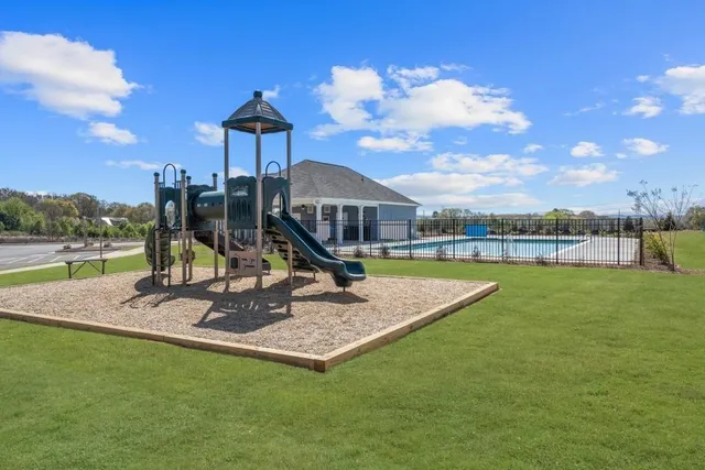 a view of a patio with a backyard