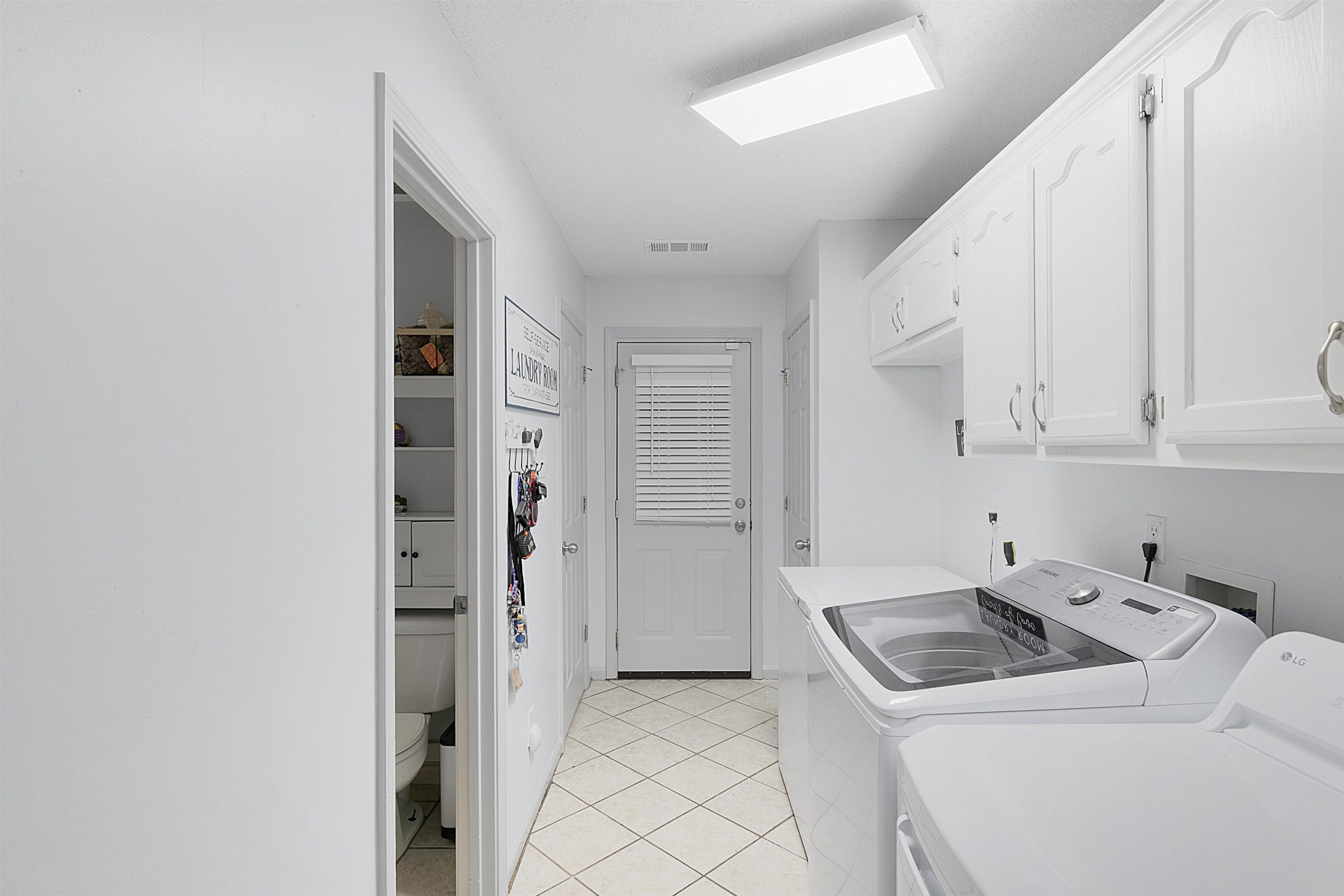 3225 Pickens Store Road Mason, TN 38049 - Photo 14 of 32 a kitchen with a sink and cabinets