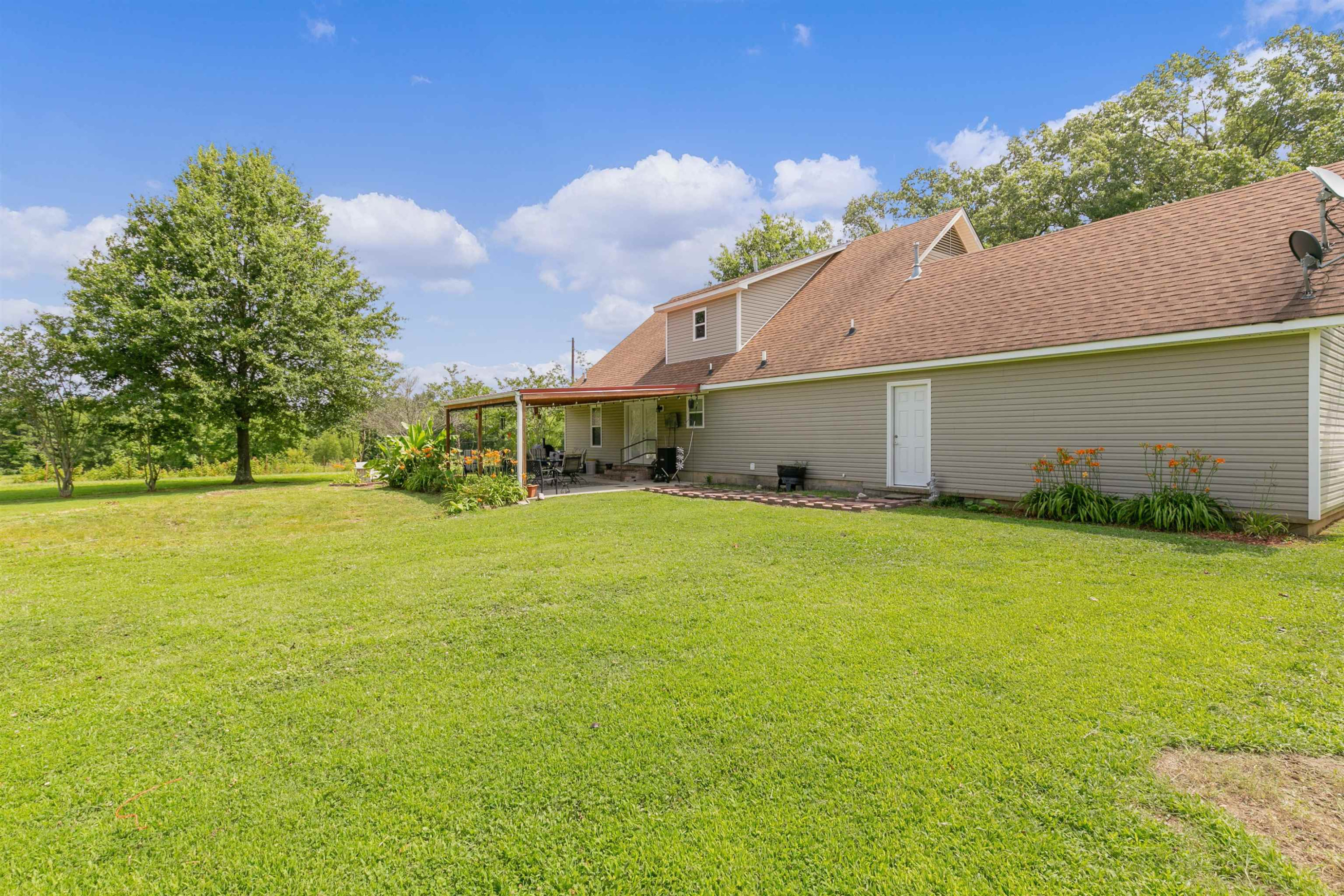 3225 Pickens Store Road Mason, TN 38049 - Photo 2 of 32 a view of a house with a yard