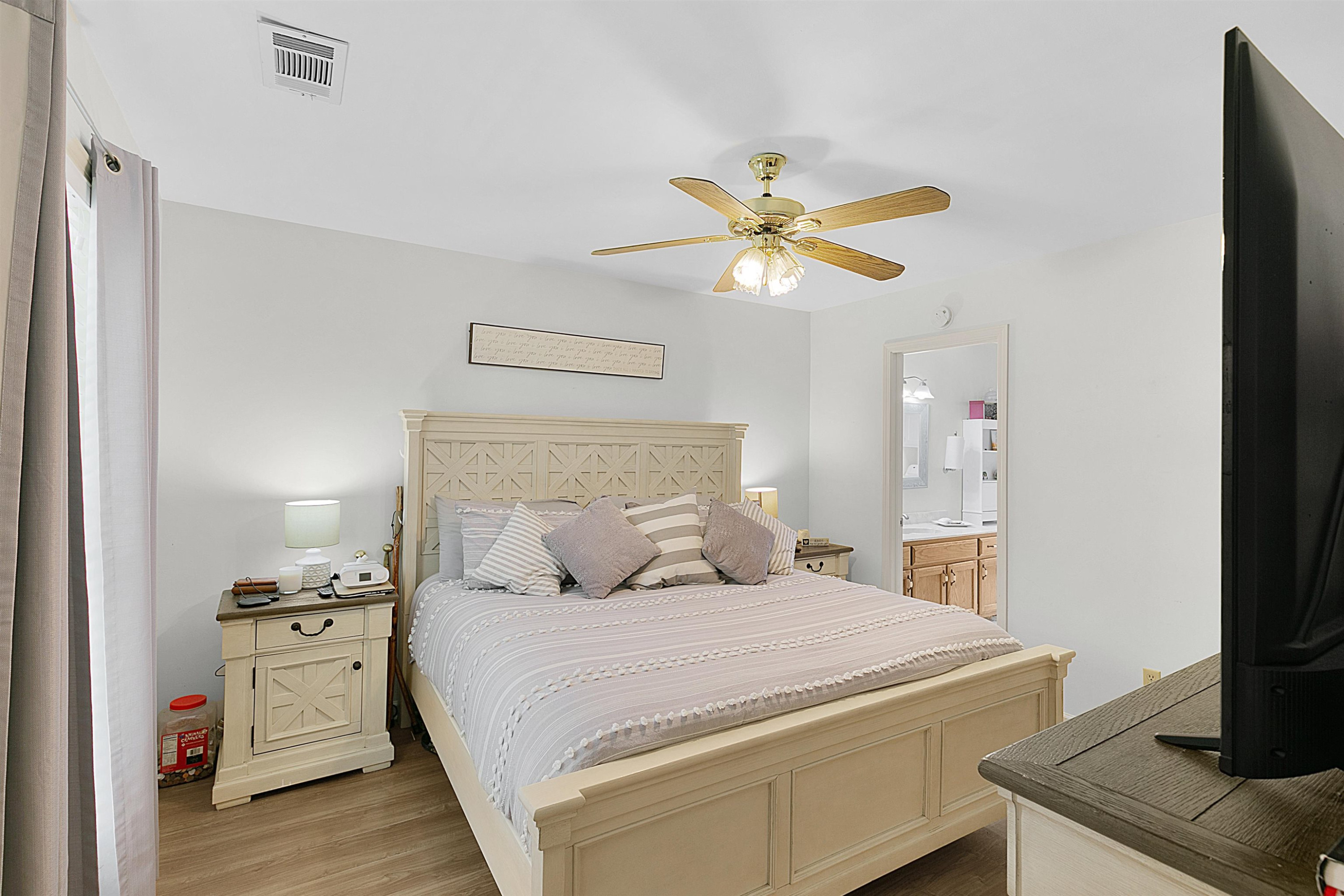 3225 Pickens Store Road Mason, TN 38049 - Photo 9 of 32 a bedroom with a bed and a tv