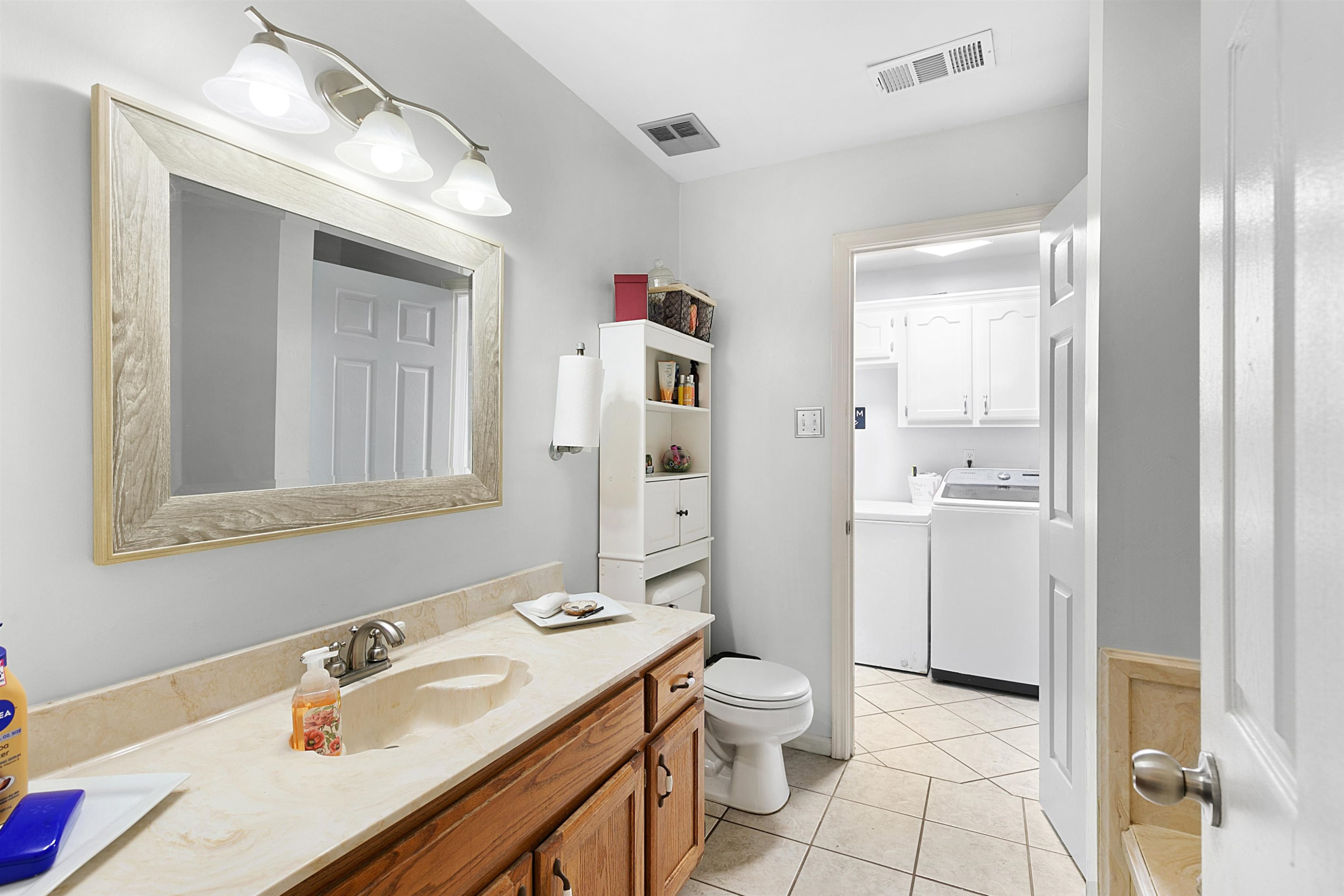 3225 Pickens Store Road Mason, TN 38049 - Photo 10 of 32 a bathroom with a sink toilet and shower