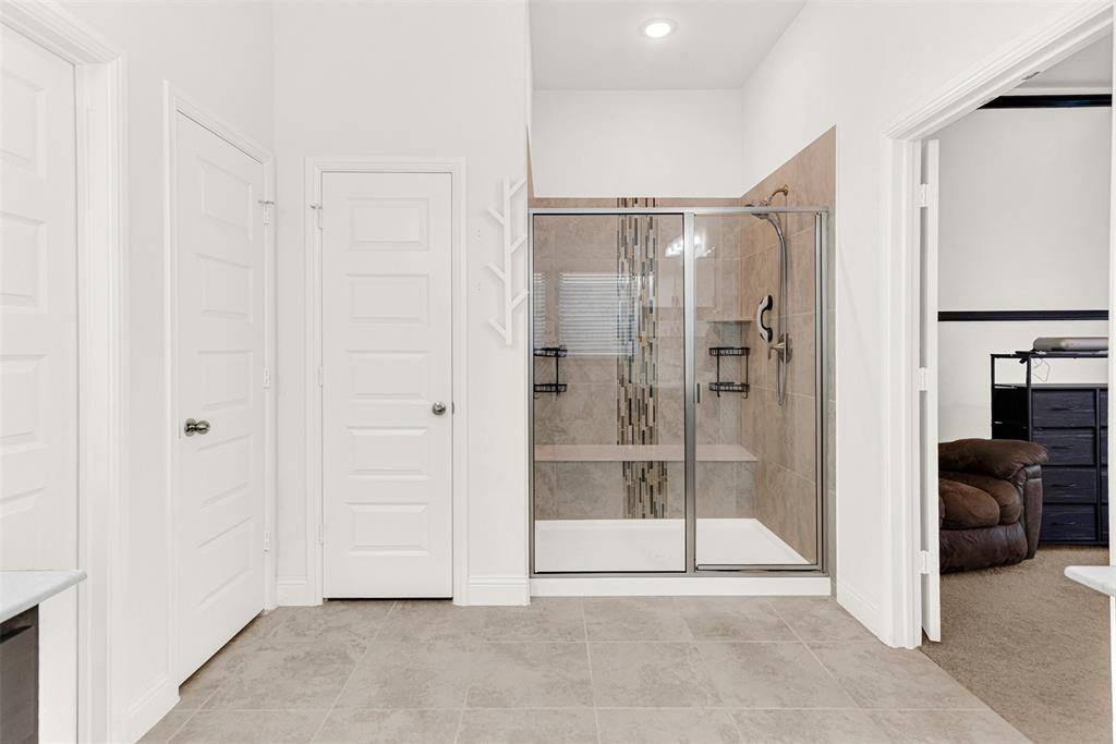 817 Amy Boulevard Anna, TX 75409 - Photo 21 of 40 a view of empty room with floor to ceiling window