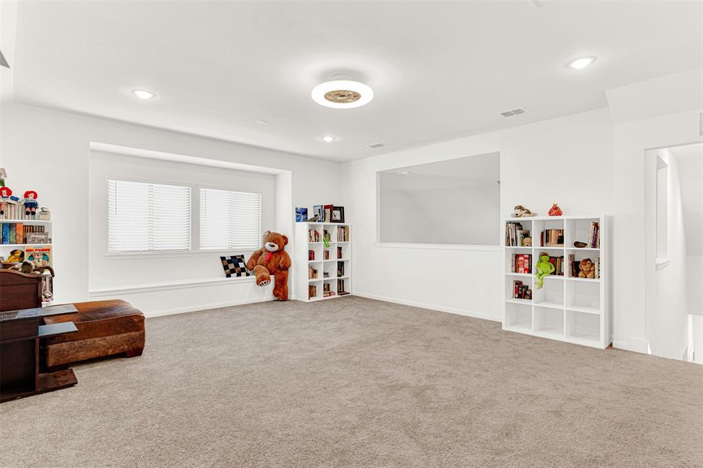 817 Amy Boulevard Anna, TX 75409 - Photo 27 of 40 a view of a livingroom with furniture and a window