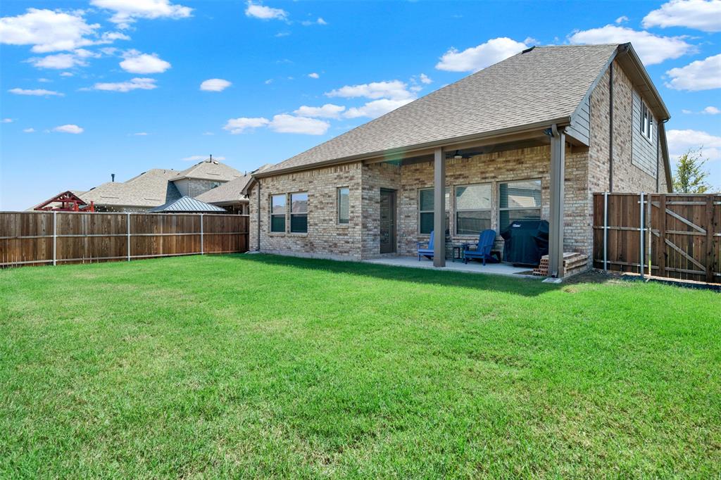 817 Amy Boulevard Anna, TX 75409 - Photo 34 of 40 a view of a house with a garden