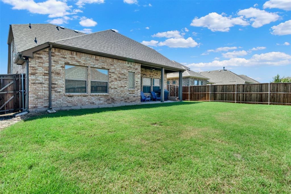 817 Amy Boulevard Anna, TX 75409 - Photo 36 of 40 a view of a house with a yard
