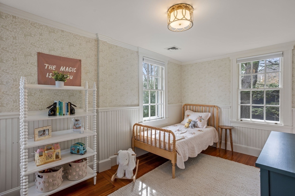 56 Pine Ridge Road Newton, MA 02468 - Photo 13 of 24 a bedroom with a bed and a window