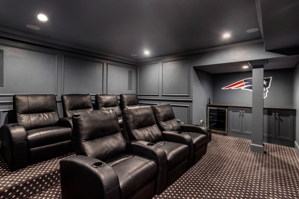 56 Pine Ridge Road Newton, MA 02468 - Photo 17 of 24 a media room with lots of chairs and a projector screen