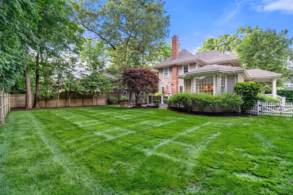 56 Pine Ridge Road Newton, MA 02468 - Photo 19 of 24 a front view of a house with garden