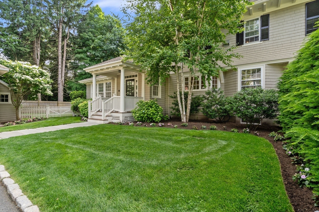 56 Pine Ridge Road Newton, MA 02468 - Photo 22 of 24 a view of a house with a yard and a garden