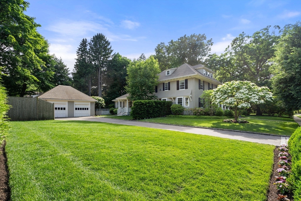 56 Pine Ridge Road Newton, MA 02468 - Photo 3 of 24 a front view of a house with garden