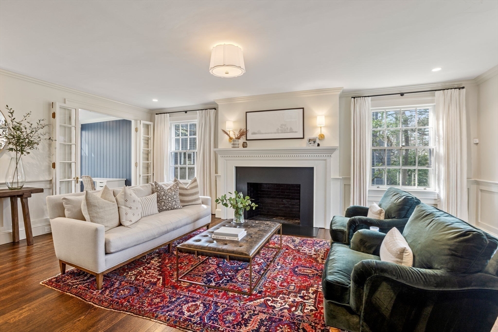 56 Pine Ridge Road Newton, MA 02468 - Photo 7 of 24 a living room with furniture and a fireplace