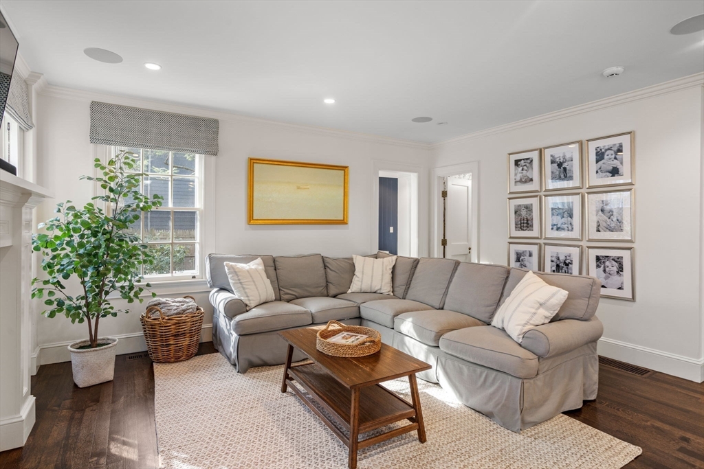 56 Pine Ridge Road Newton, MA 02468 - Photo 8 of 24 a living room with furniture and a potted plant