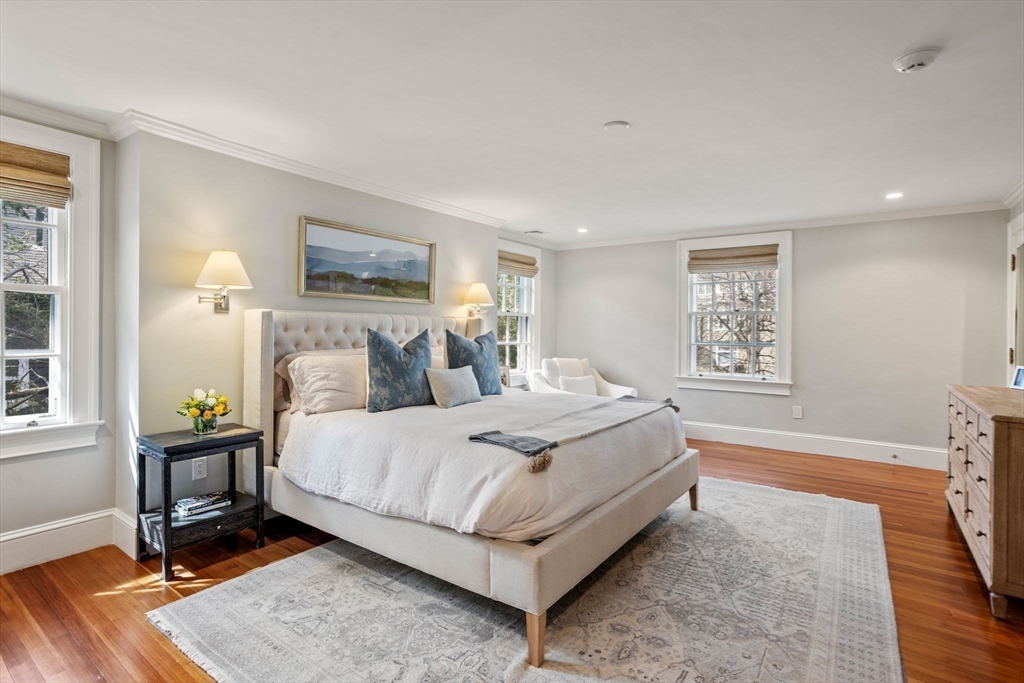 56 Pine Ridge Road Newton, MA 02468 - Photo 10 of 24 a bedroom with a bed wooden floor and window