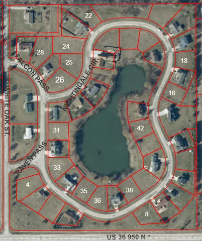 an aerial view of a house with a swimming pool