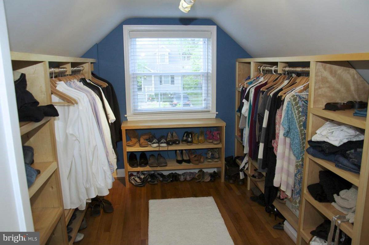 525 Windwood Road Baltimore, MD 21212 - Photo 6 of 6 a view of walk in closet with clothes and shoes