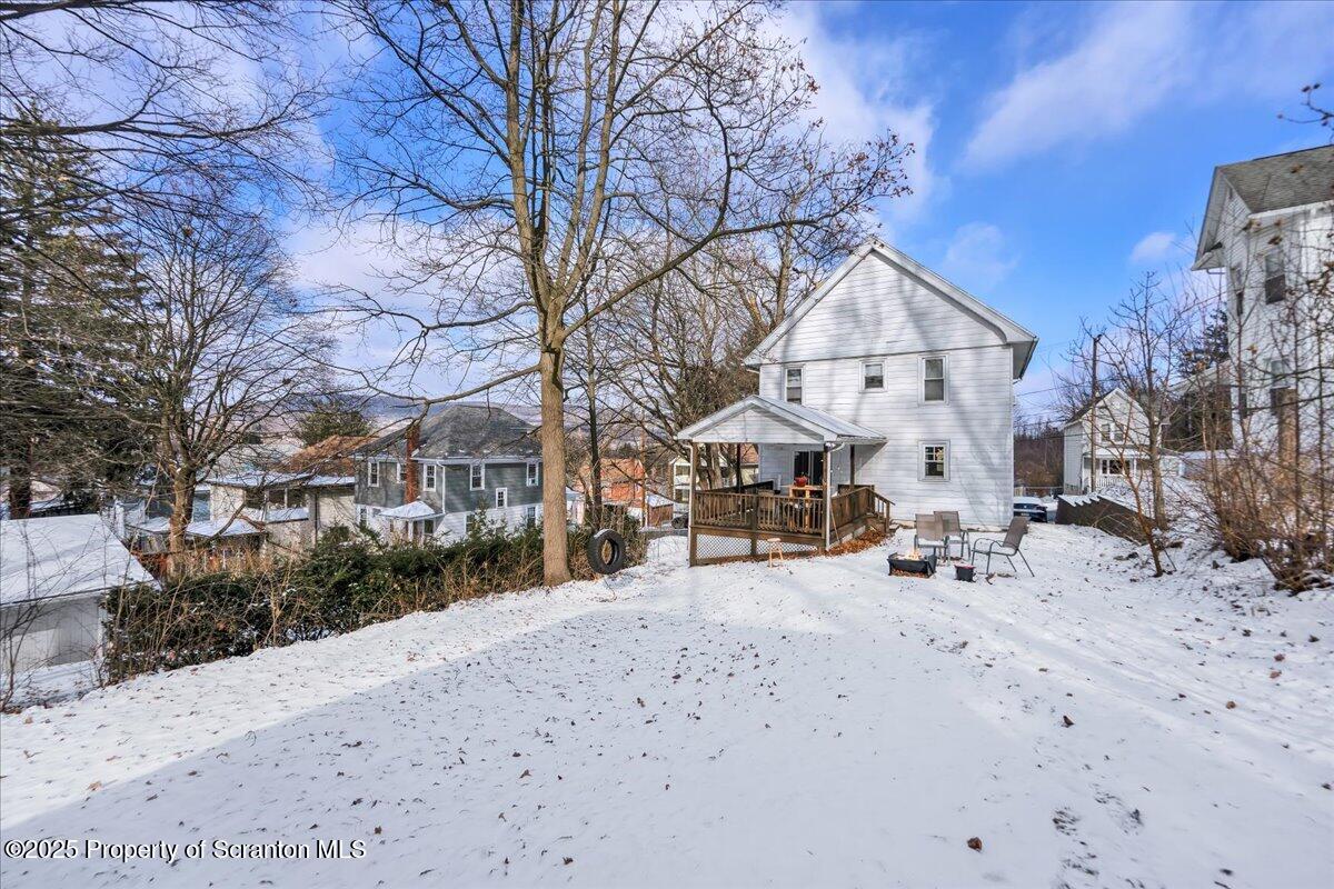 Undisclosed Address Scranton, PA 18509 - Photo 22 of 26 a view of a house with a snow on the road
