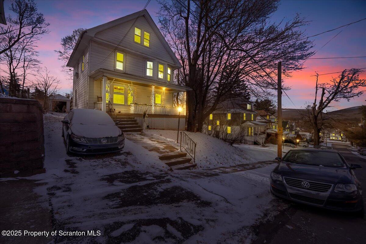 Undisclosed Address Scranton, PA 18509 - Photo 26 of 26 a front view of a house with a yard