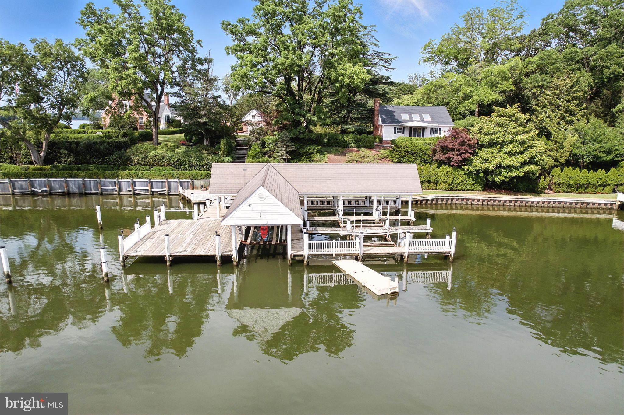 10750 Sawpit Cove Road Lusby, MD 20657 - Photo 10 of 71 Covered dock with multiple slips