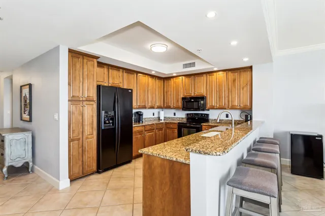 a bathroom with a bathtub a sink and a mirror