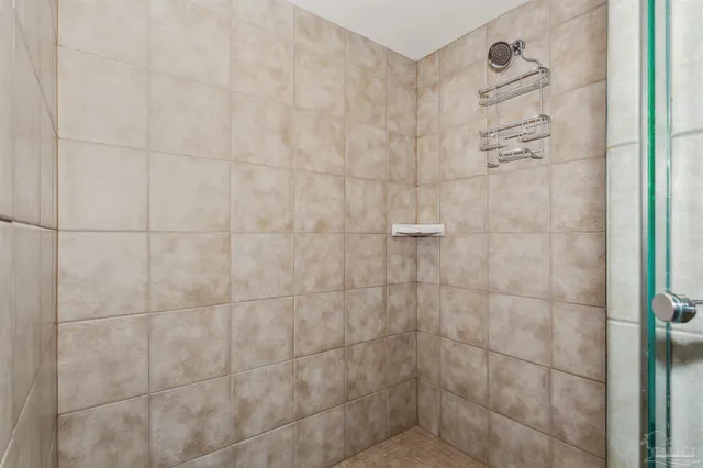 a view of a house with swimming pool and sitting area