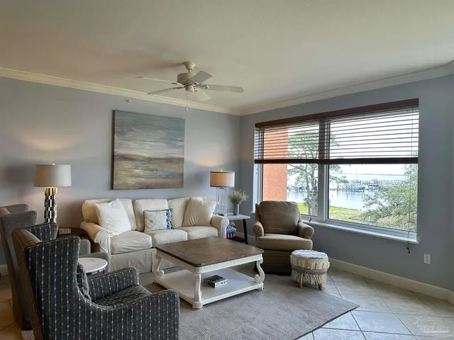 a living room with furniture and a window