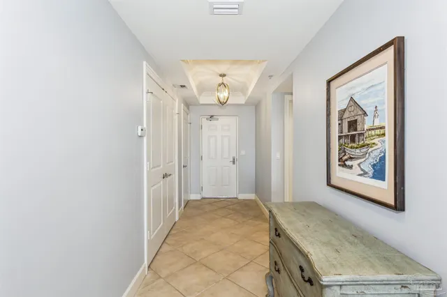 a view of a hallway with a bathroom