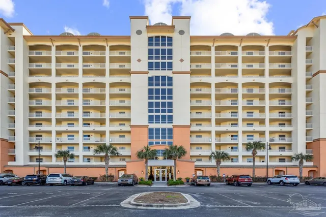 a potted plant sitting in front of a building