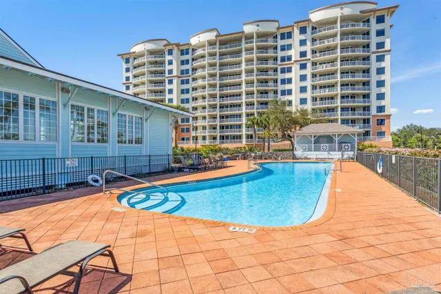 a view of a balcony with chairs