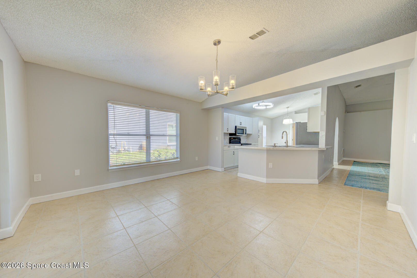 3353 Echo Ridge Place Cocoa, FL 32926 - Photo 22 of 51 dining room & kitchen
