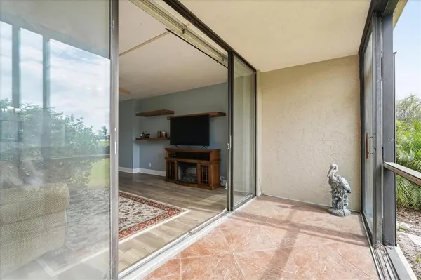a kitchen with stainless steel appliances a stove a microwave and a refrigerator