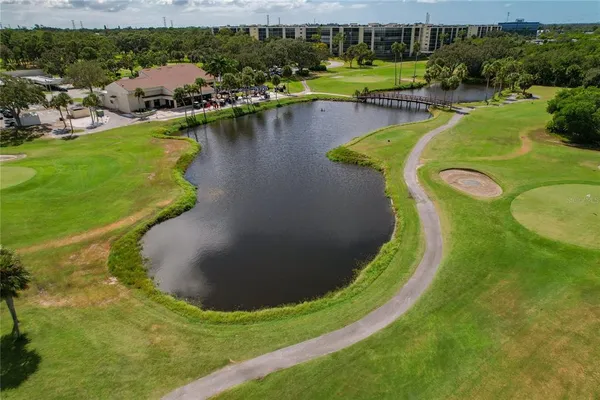 an aerial view of a city with lawn chairs