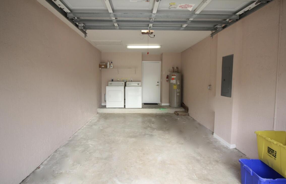 1041 Arezzo Circle Boynton Beach, FL 33436 - Photo 20 of 29 Garage with Washer/Dryer