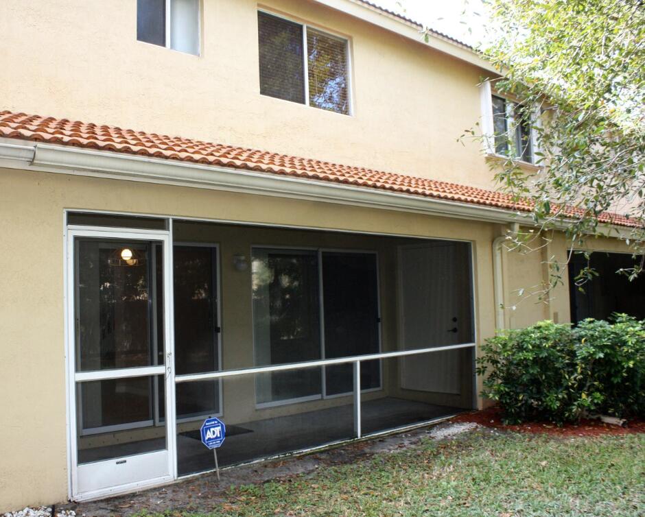 1041 Arezzo Circle Boynton Beach, FL 33436 - Photo 22 of 29 Rear Screened Patio Area