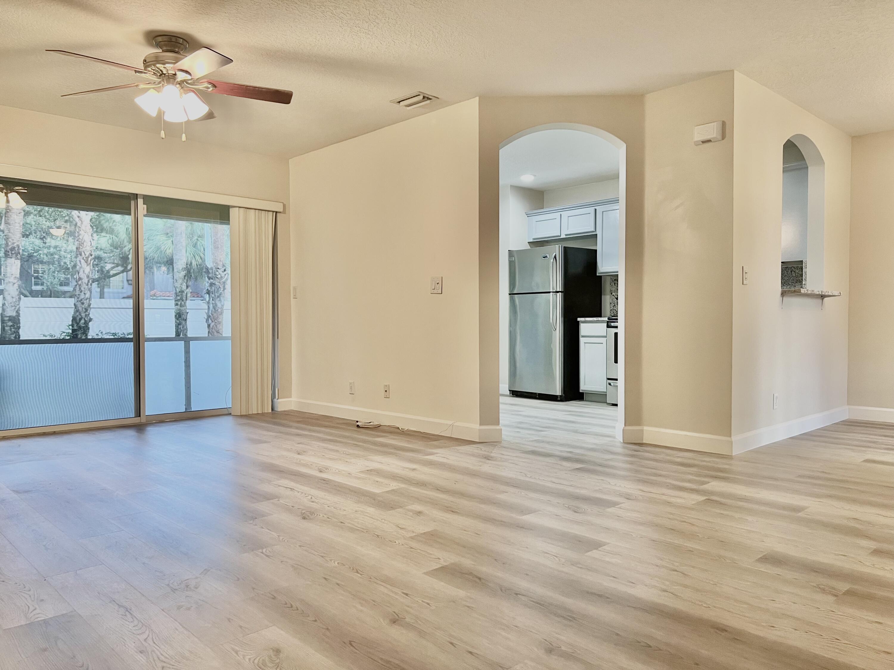 1041 Arezzo Circle Boynton Beach, FL 33436 - Photo 5 of 29 BEAUTIFUL NEW FLOORING