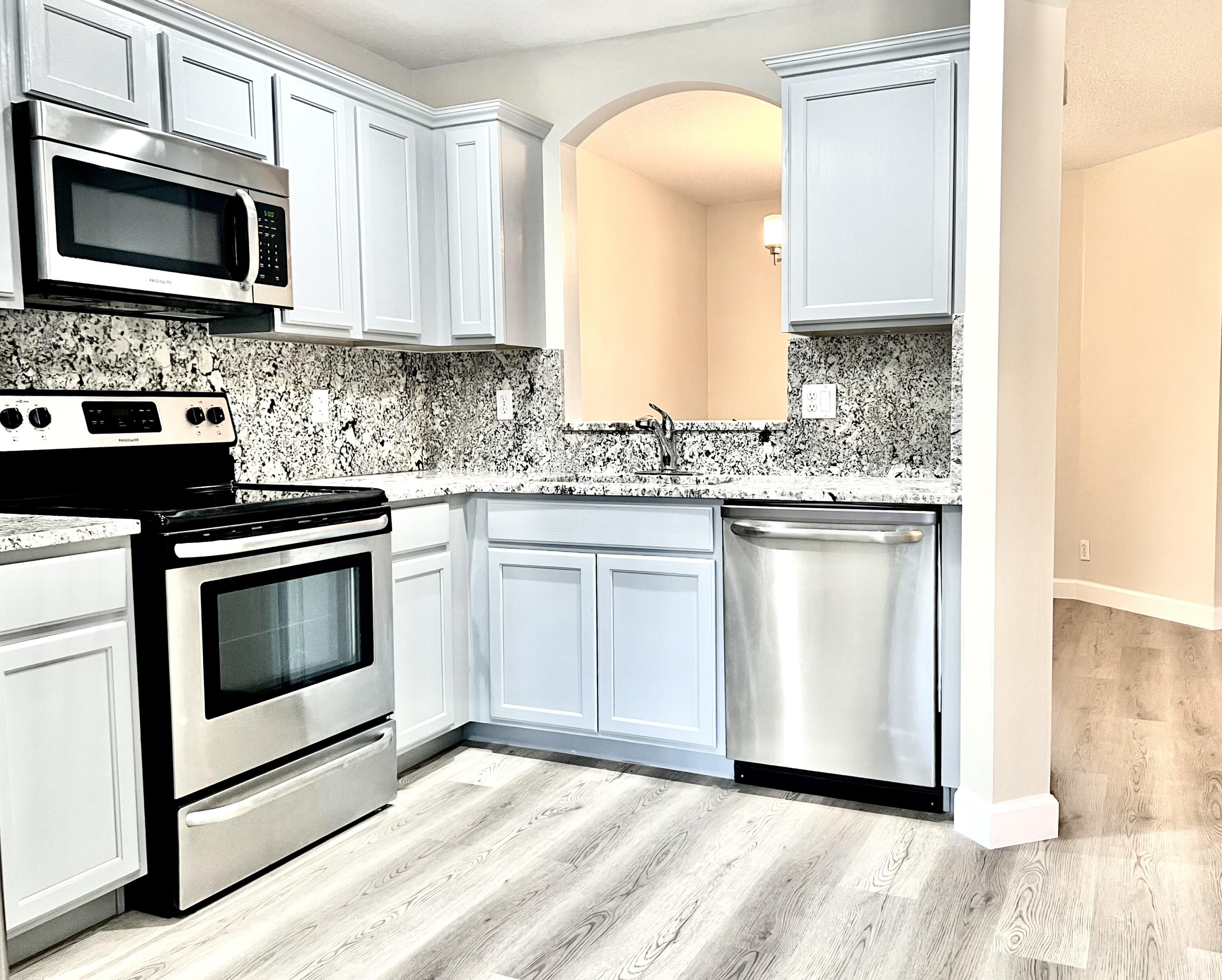 1041 Arezzo Circle Boynton Beach, FL 33436 - Photo 7 of 29 KITCHEN WITH GREY CABINETS