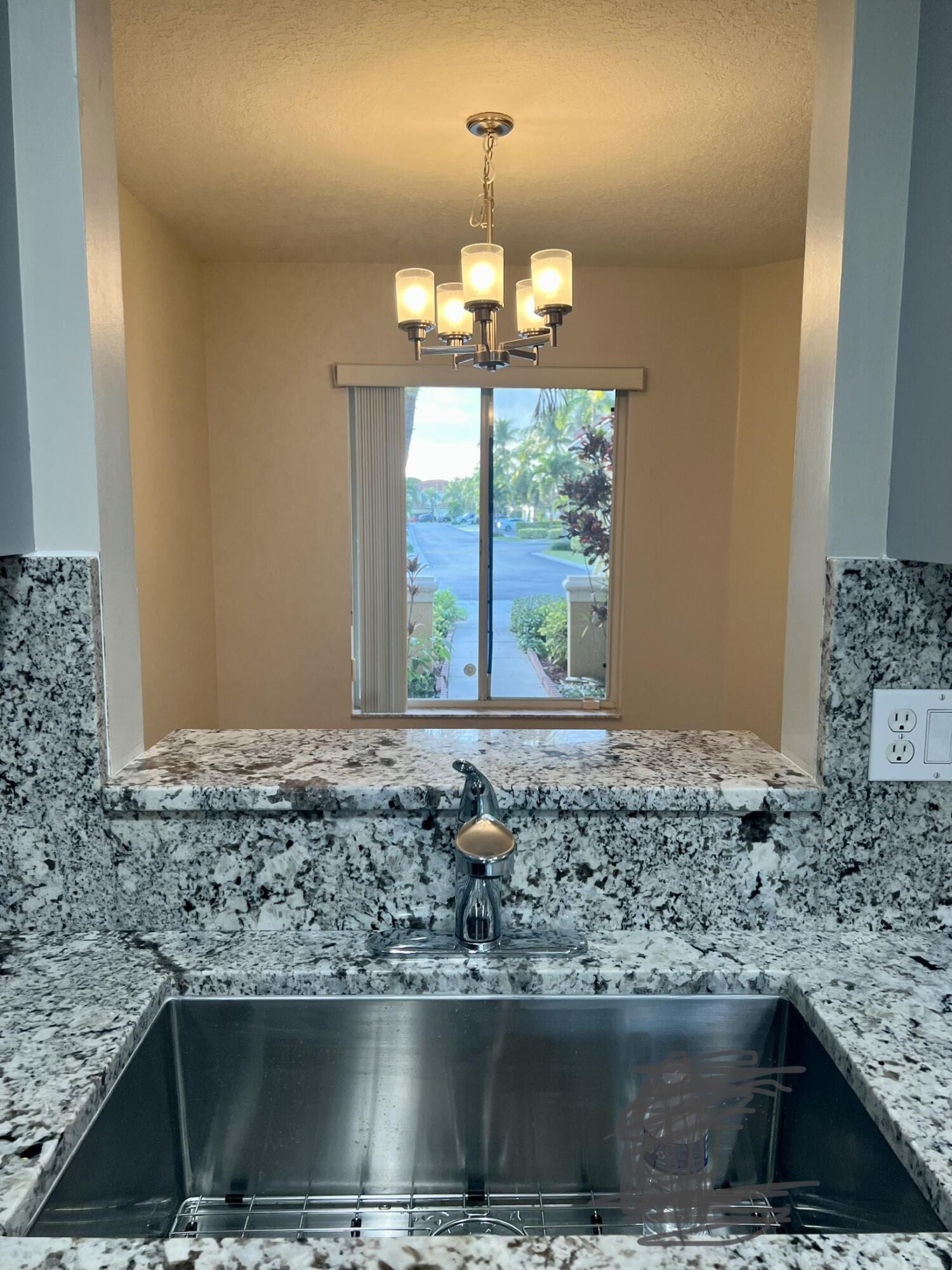 1041 Arezzo Circle Boynton Beach, FL 33436 - Photo 10 of 29 KITCHEN BYPASS