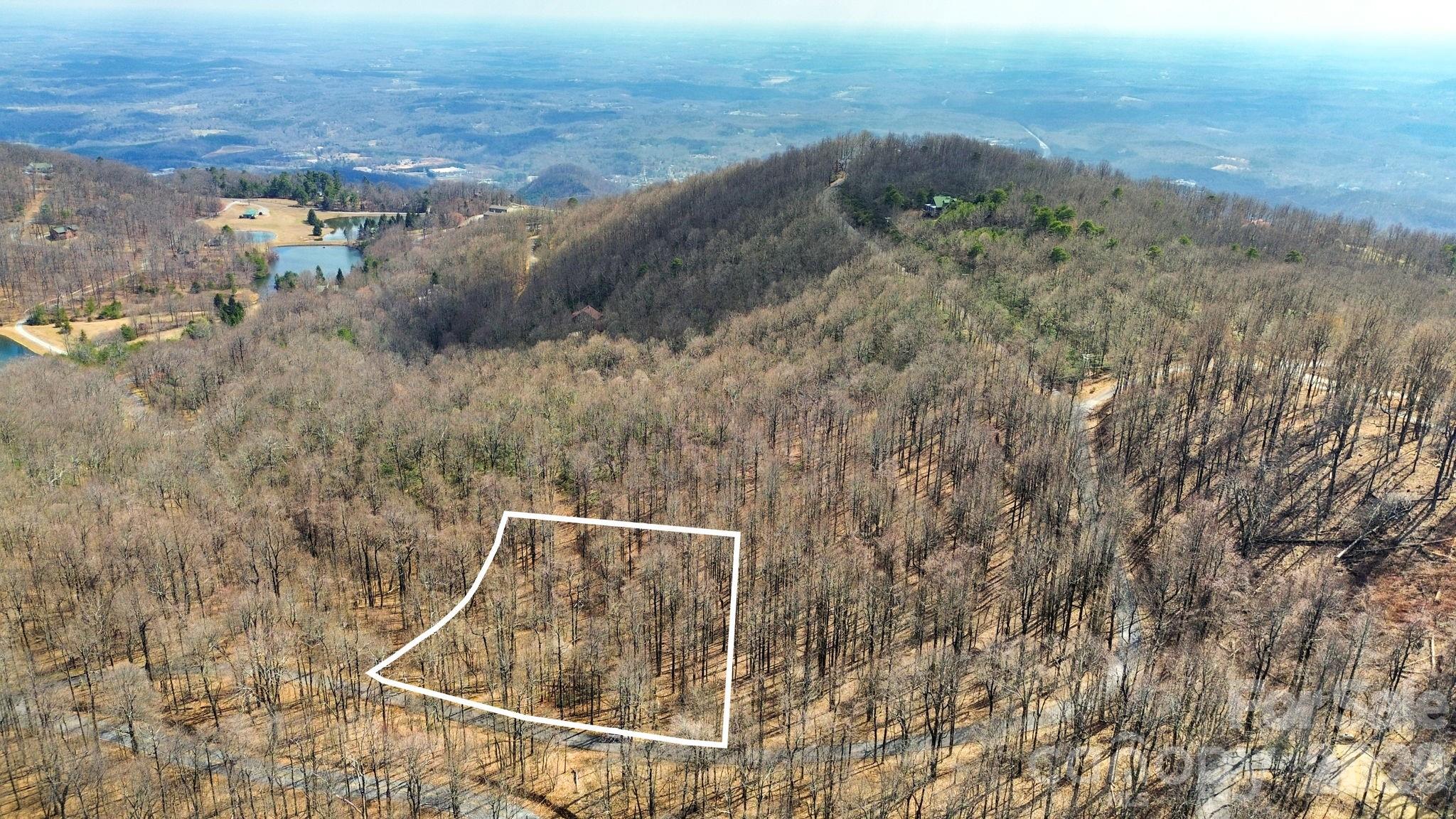 Lot 20 Sunset Ridge Drive, Unit 20 Columbus, NC 28722 - Photo 2 of 18 an aerial view of mountain with beach