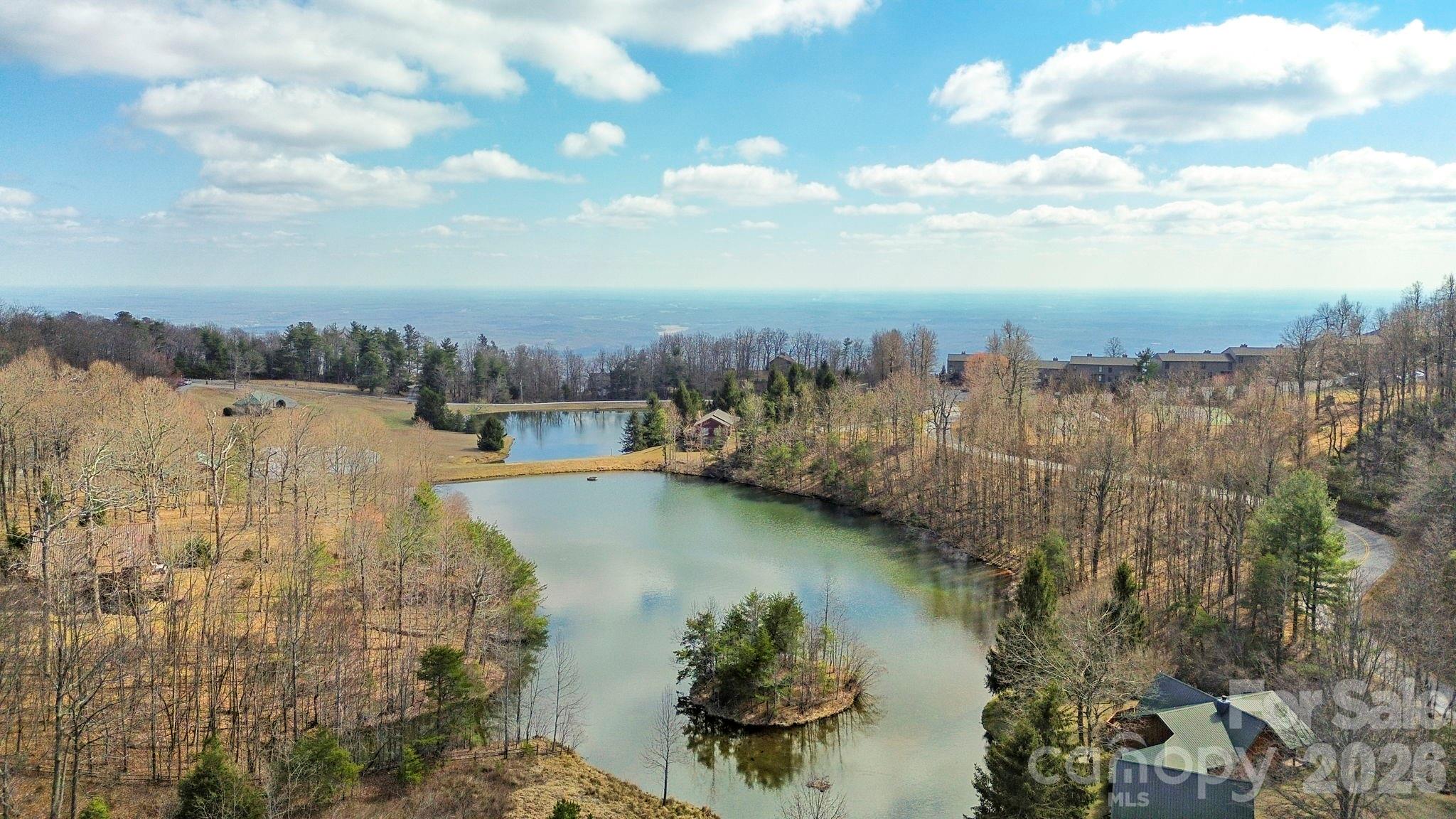 Lot 20 Sunset Ridge Drive, Unit 20 Columbus, NC 28722 - Photo 10 of 18 a view of a lake in middle of the town