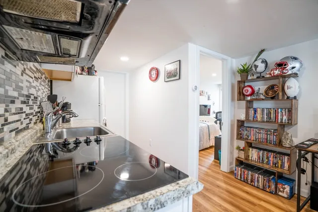a view of a livingroom with furniture and toys