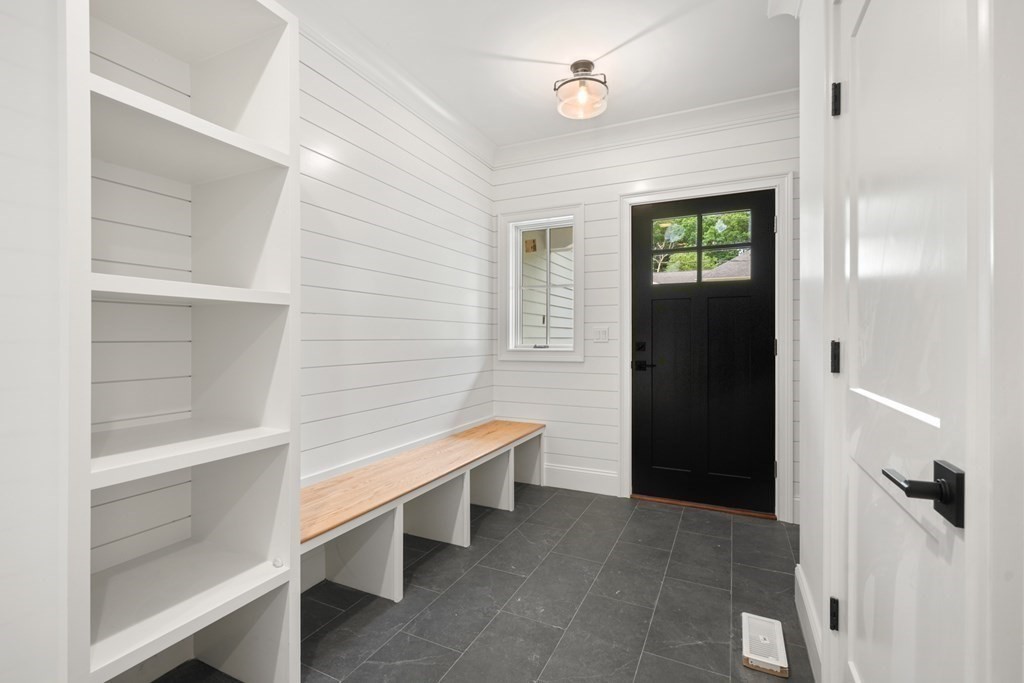 22 Suffolk Road Wellesley, MA 02481 - Photo 19 of 39 a bathroom with a sink and a mirror