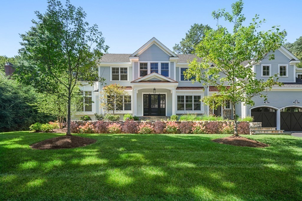 22 Suffolk Road Wellesley, MA 02481 - Photo 2 of 39 a front view of house with yard and green space