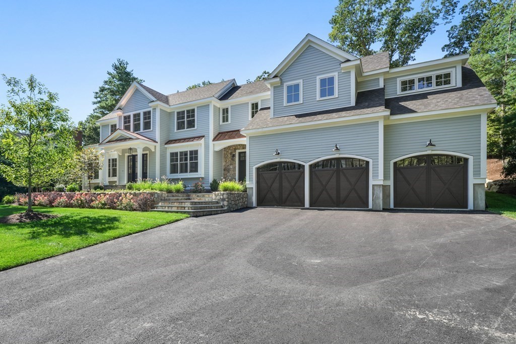 22 Suffolk Road Wellesley, MA 02481 - Photo 3 of 39 a front view of house with yard and trees