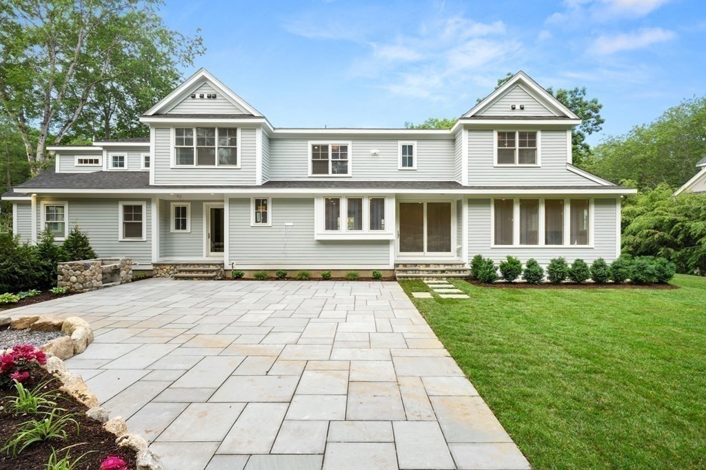 22 Suffolk Road Wellesley, MA 02481 - Photo 31 of 39 front view of a house with a yard