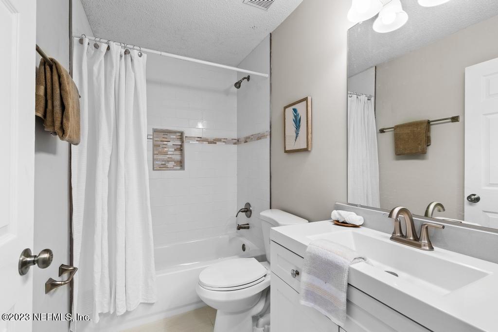 1652 Spring Oaks Lane Jacksonville, FL 32221 - Photo 24 of 37 a bathroom with a sink toilet and shower