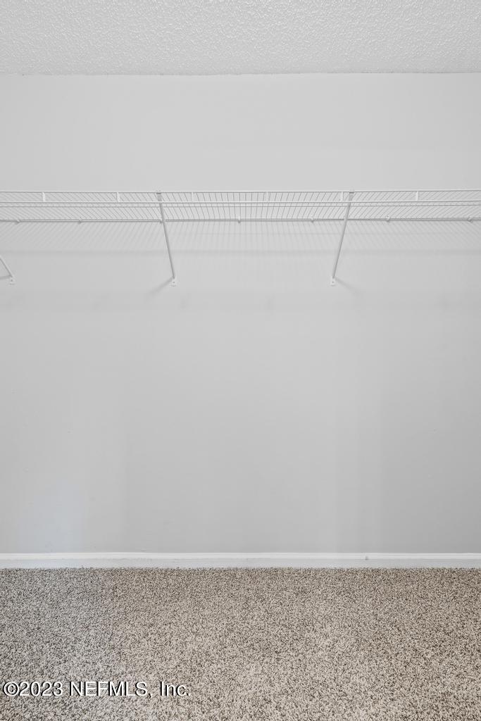 1652 Spring Oaks Lane Jacksonville, FL 32221 - Photo 35 of 37 a view of a room with racks on the wall