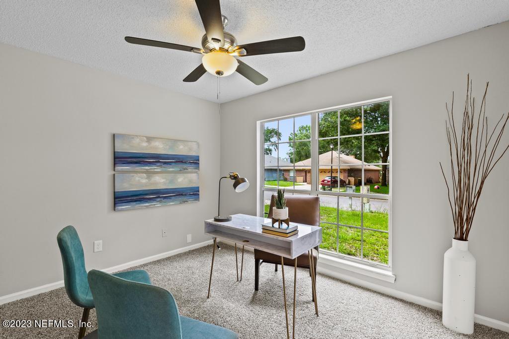 1652 Spring Oaks Lane Jacksonville, FL 32221 - Photo 4 of 37 a view of a livingroom with furniture and a window