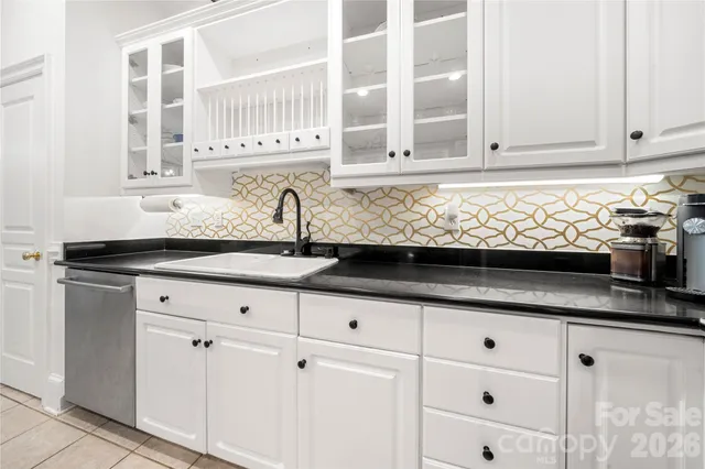 a bathroom with a double vanity sink mirror and double