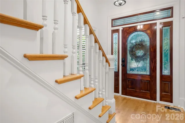 a living room with furniture fireplace and a flat screen tv