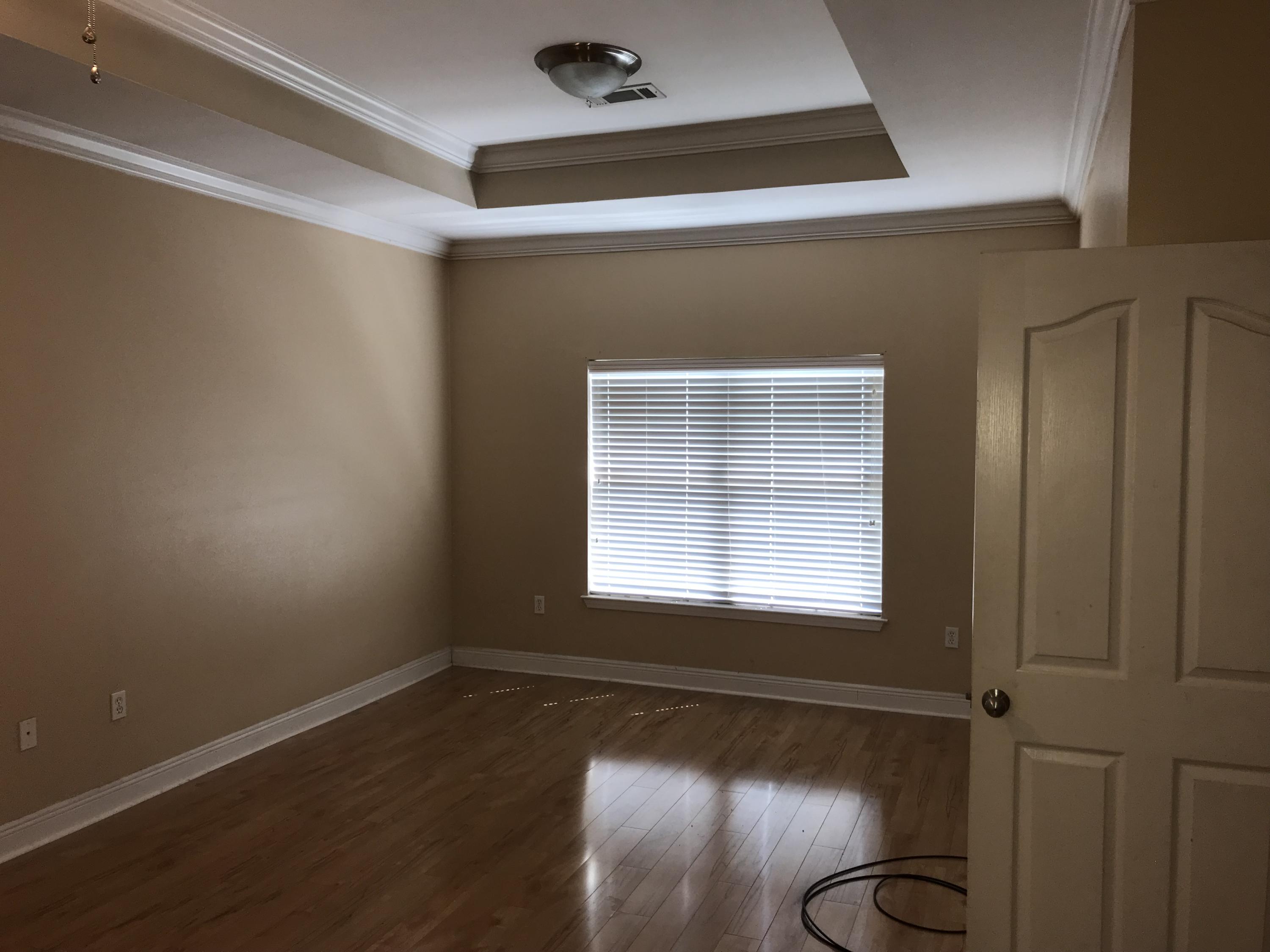 402 Wych Circle Crestview, FL 32536 - Photo 6 of 17 an empty room with a window