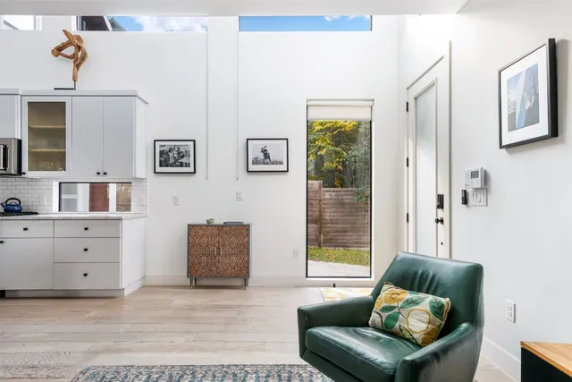 a living room with furniture and window